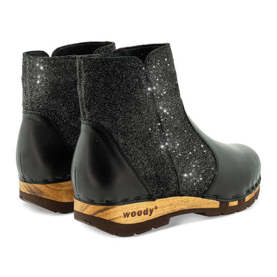 [Nero-Argento] Olga Damen Clog Stiefelette schwarz glitter woody. Damenstiefelette olga, clog stiefelette damen mit biegsamer nachhaltiger holzsohle, farbe: nero-argento (schwarz - schwarz mit silbernem glitter), holzclogs woody, woody schuhe, woody shoes, handgemachte holzschuhe aus österreich, kärnten