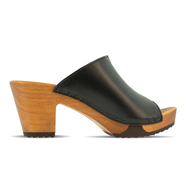 [Schwarz] Elly Damen Clog Pantolette in schwarz. Damen Pantolette von woody. elly, farbe: schwarz, clogs pantolette damen mit absatz mit biegsamer nachhaltiger weidenholzsohle, holzclogs woody, woody schuhe, woody shoes, handgemachte holzschuhe aus österreich, kärnten